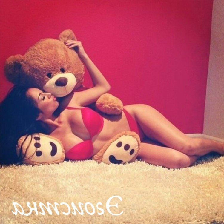 Girl with plush bear