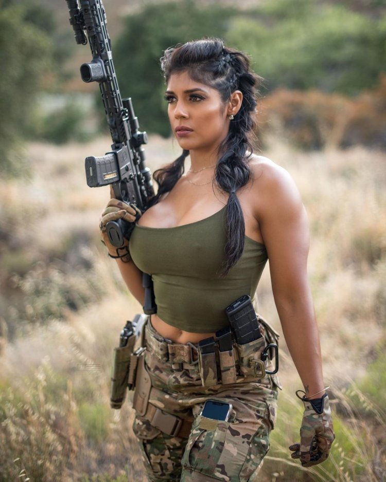 Samantha Boinla with weapons
