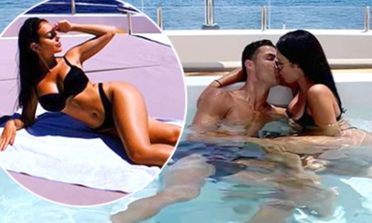 Georgina Rodriguez and Cristiano Ronaldo on the beach