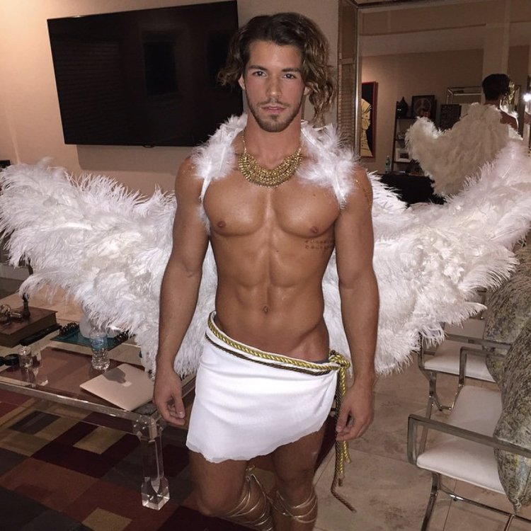 A guy in an angel costume