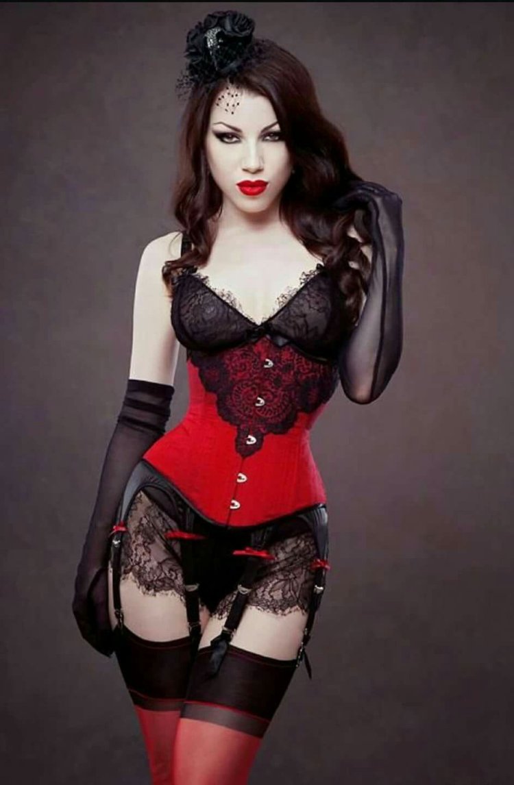 Ursula Mayes in a corset