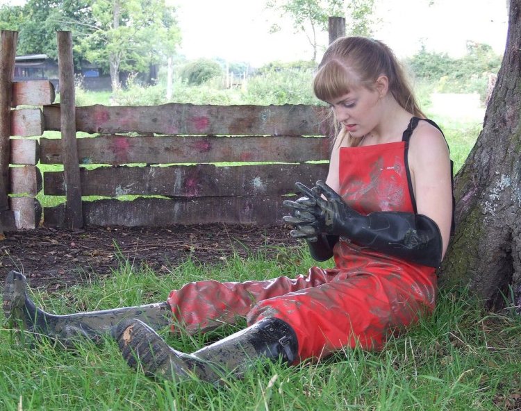 Girl in rubber gloves and boots