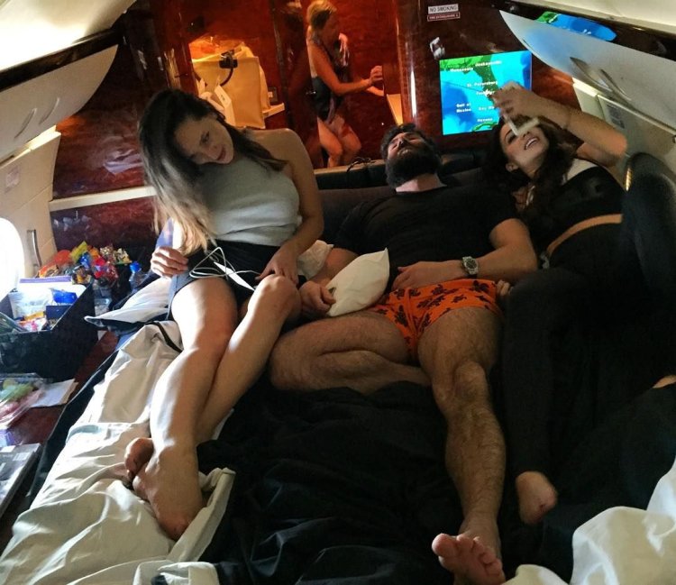 Dan Bilserian and his girls on an airplane