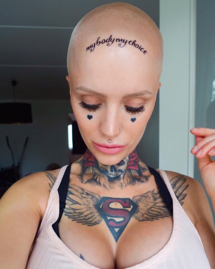 Bald girls with tattoo