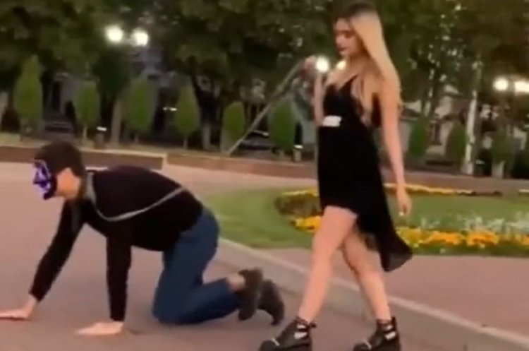 The guy is on the leash