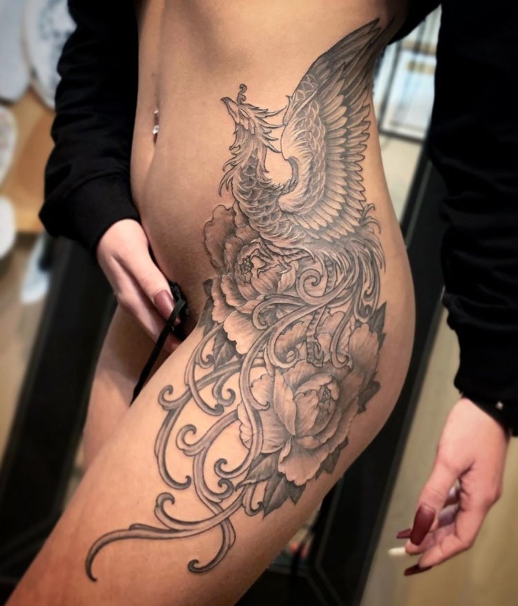 Tattoo Phoenix on the hip