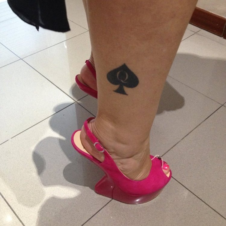 Lady of the peak tattoo on the leg