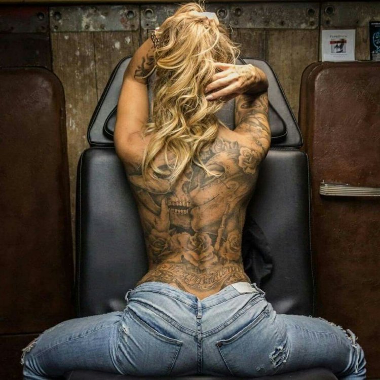 Tattooed back of the girl