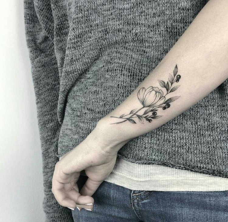 Tattoo twig on the arm