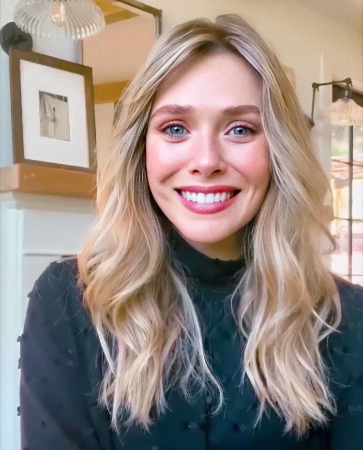 Elizabeth Olsen with a cat