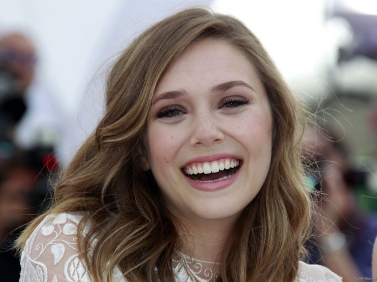 Elizabeth Olsen smiles