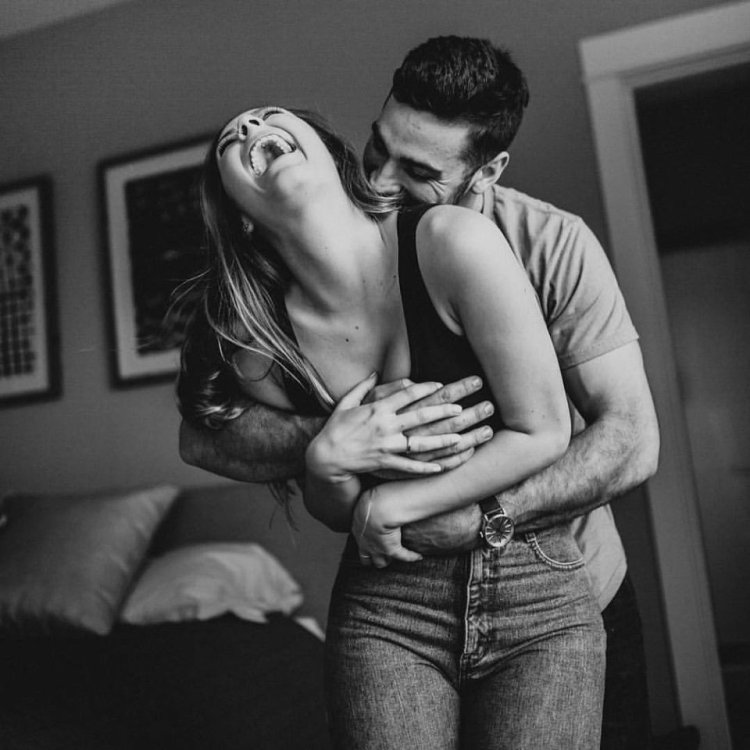 Girl in the arms of a man