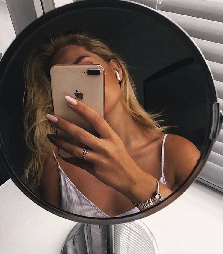 Blonde with an iPhone