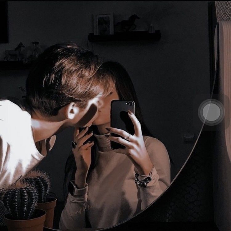 A guy with a girl in the mirror