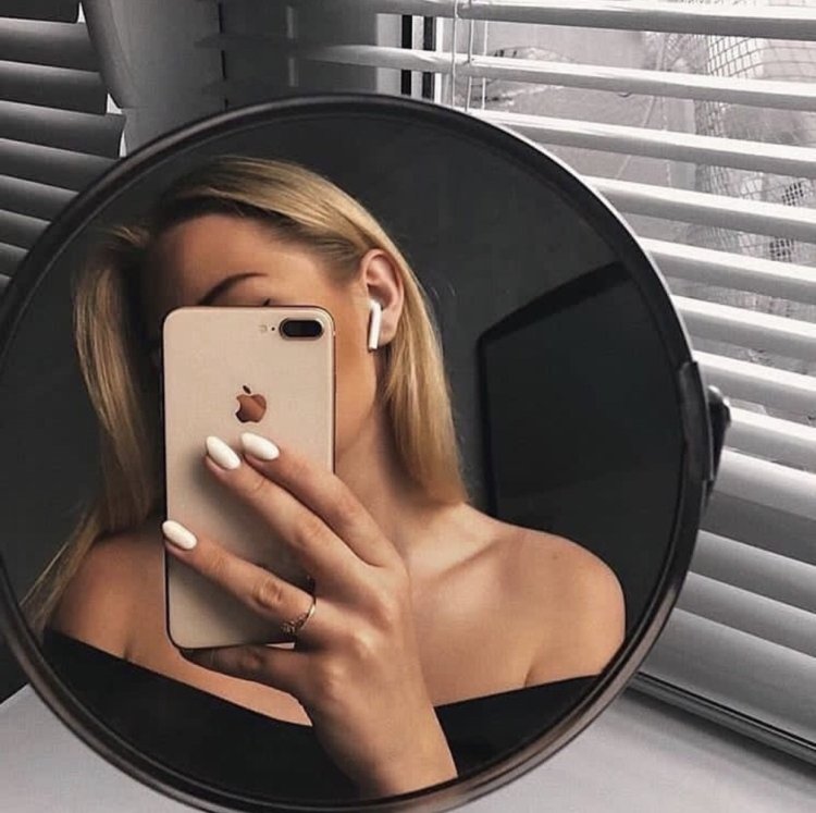 Beautiful girl in the mirror