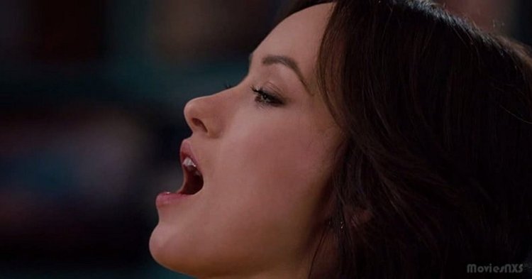 The face of a moaning woman