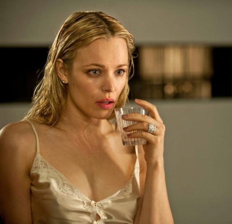 Rachel Mack Addams smokes