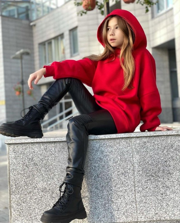 Milana Hametova in a suit