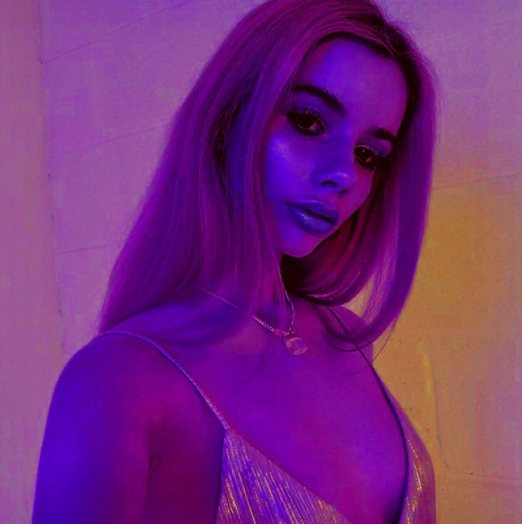 The girl's face is purple