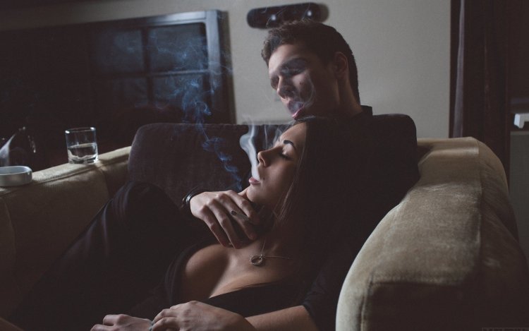 Girl and man smoke
