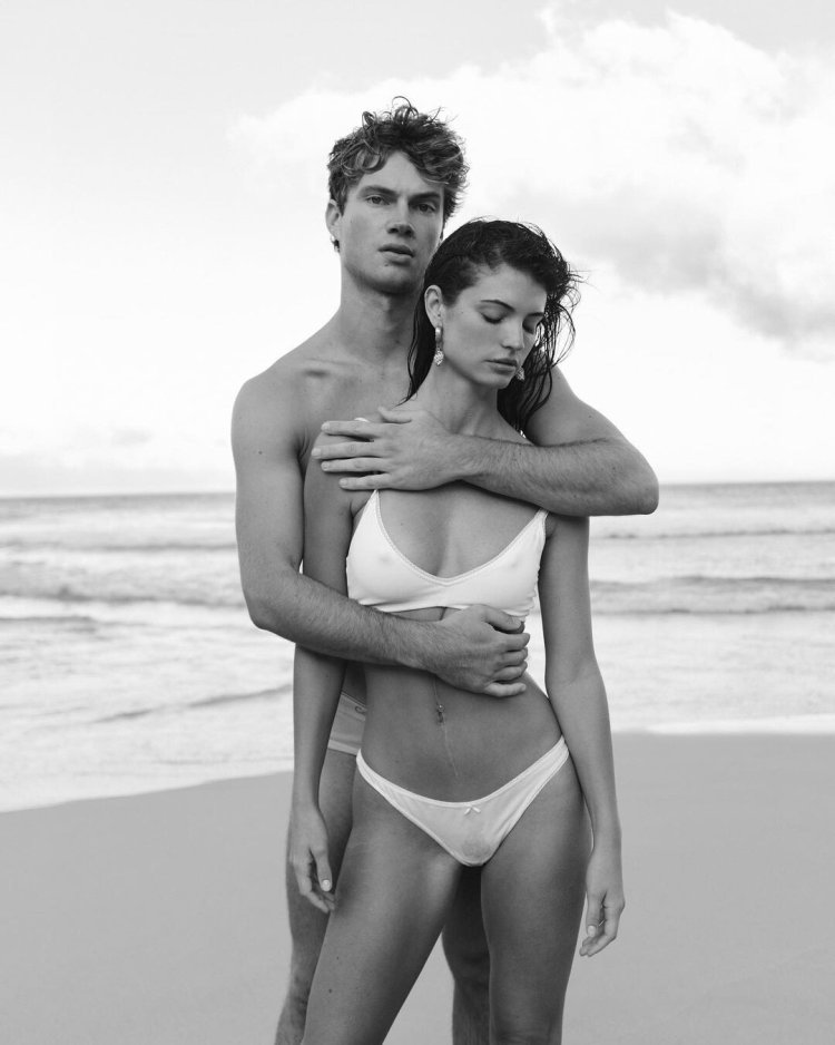 Josie Maran with a man