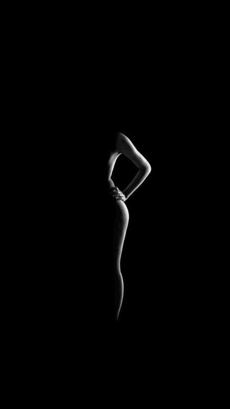 Female figure in the dark