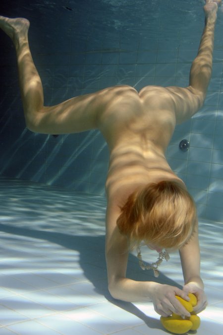 Naked beauties underwater