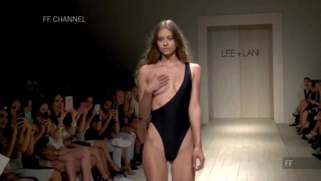 Fashion show with bare breasts