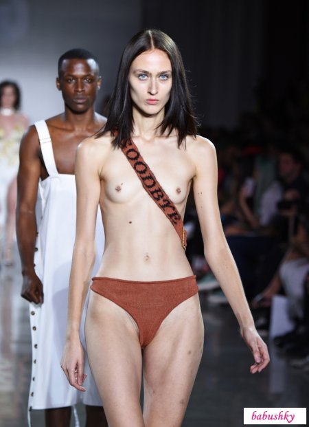 Naked fashion model on the catwalk