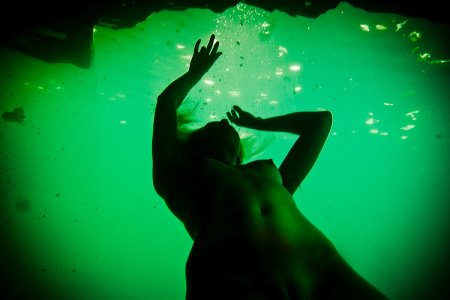 Underwater shooting of naked women