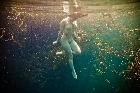 Submarine swimming nude