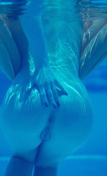 Asses of girls underwater
