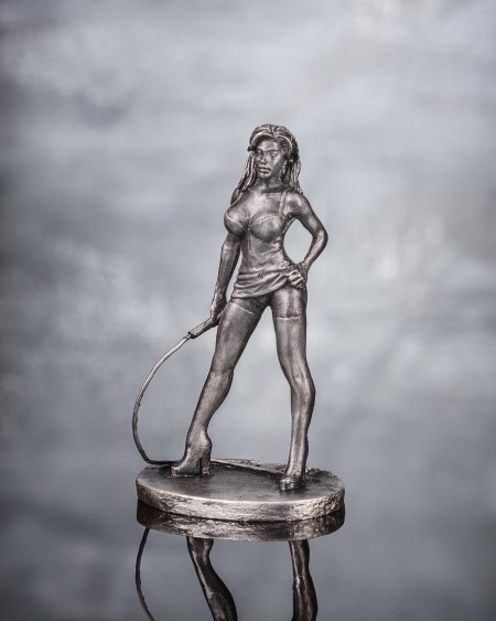 Figurine woman with whips of bronze