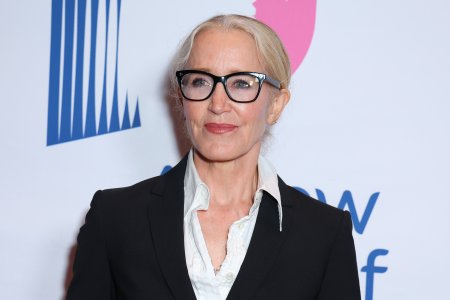 Felicity Huffman waves