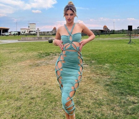 The girl glorifies herself with tape