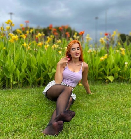 The girl lifts the dress