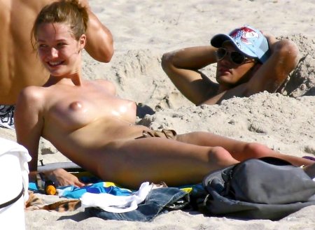 Girls sunbathe topless