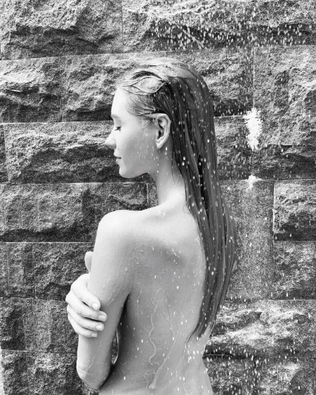 A fashion model in the shower