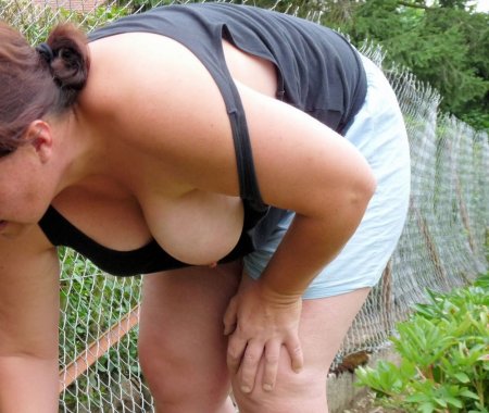 The girl bent down and lit up the boobs