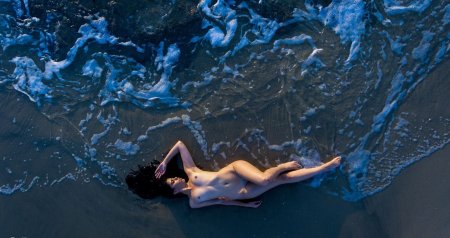 Girl in the ice is very beautiful nude