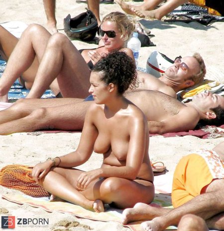 Naked swingers on a public beach