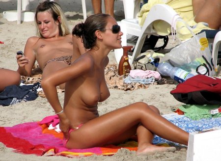 Toples sunbathing on a public beach