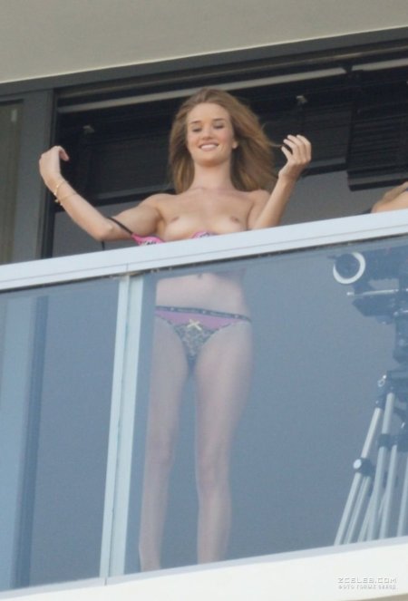 Rosie Huntington on the balcony