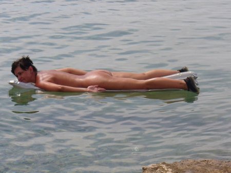 Swim in the sea with naked