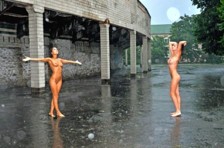 Naked on the street in the rain