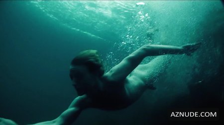 A naked man and a naked woman dive