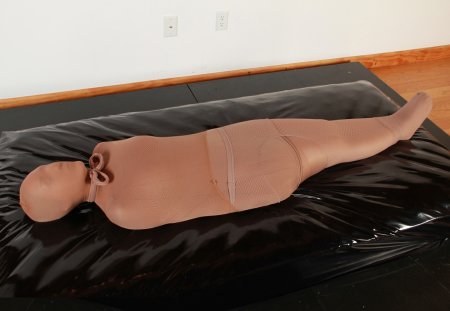 Bondage mummification in tights